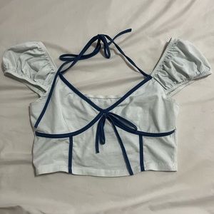 White shirt with blue accents